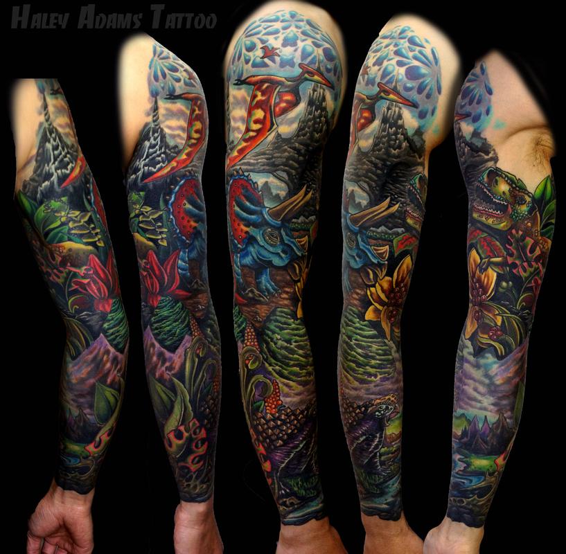 Dinosaur sleeve by Haley Adams Tattoos